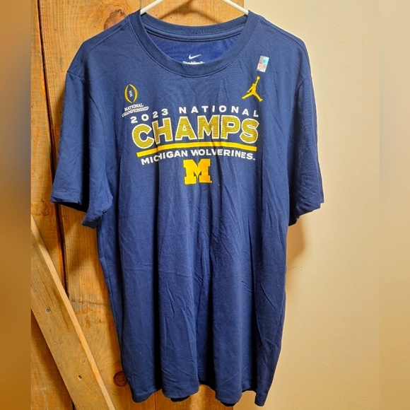 A Nike official Michigan Wolverine dri-fit tee shirt in a men's small. NWOT - Picture 1 of 6